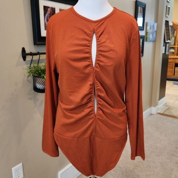 royalty by maluma Tops - NWOT Royalty burnt orange cutout bodysuit XXXL